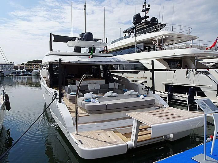 a boat docked at a pier aboard D&B Yacht for Sale