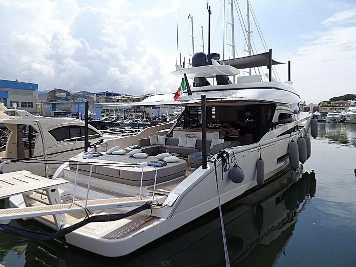 a boat docked at a pier aboard D&B Yacht for Sale
