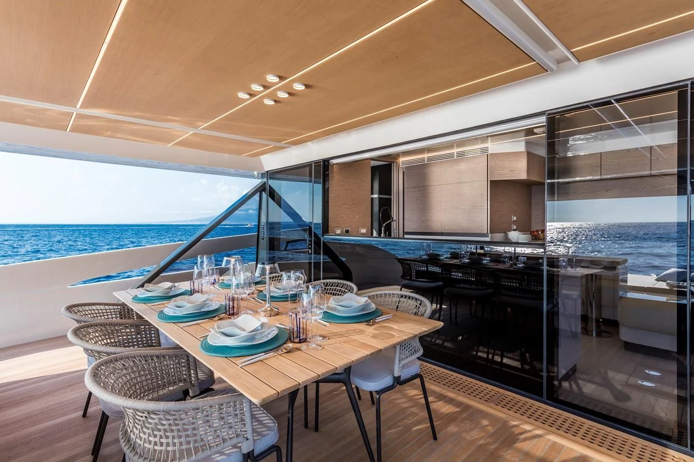 a table set for a meal on a boat aboard D&B Yacht for Sale