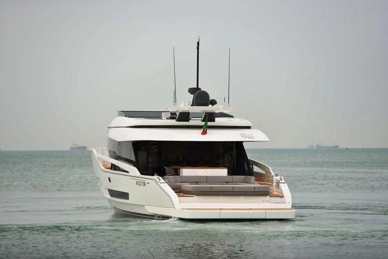 a white boat in the water aboard D&B Yacht for Sale