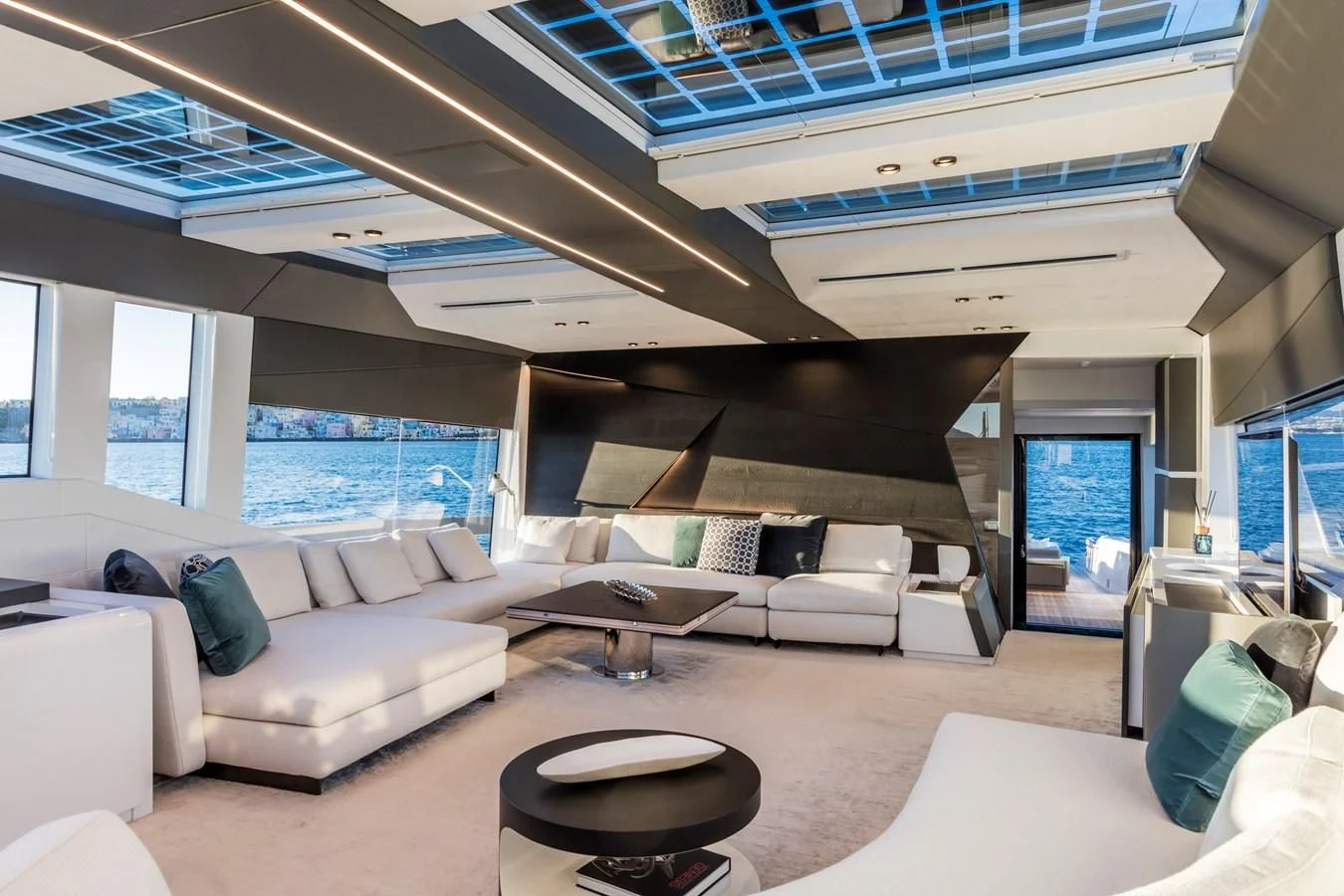 a room with a couch and a table aboard D&B Yacht for Sale