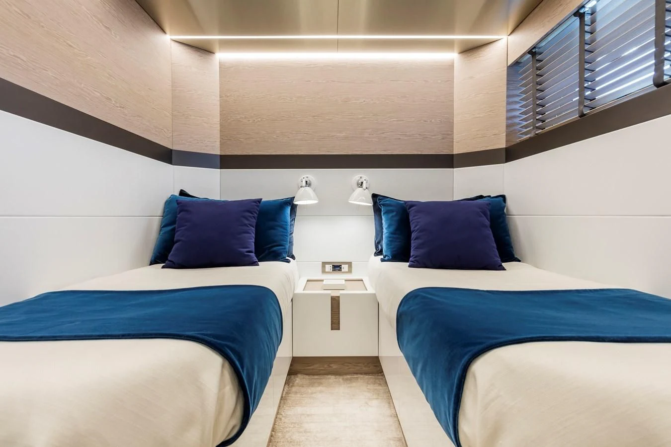 a couple of beds in a room aboard D&B Yacht for Sale