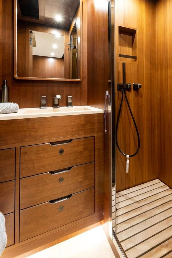 a bathroom with a mirror aboard ONE DAY Yacht for Sale