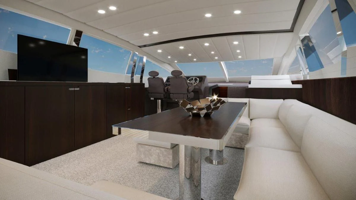a room with a table and a tv aboard ONE DAY Yacht for Sale