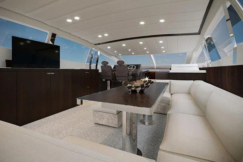 a room with a table and a couch aboard ONE DAY Yacht for Sale