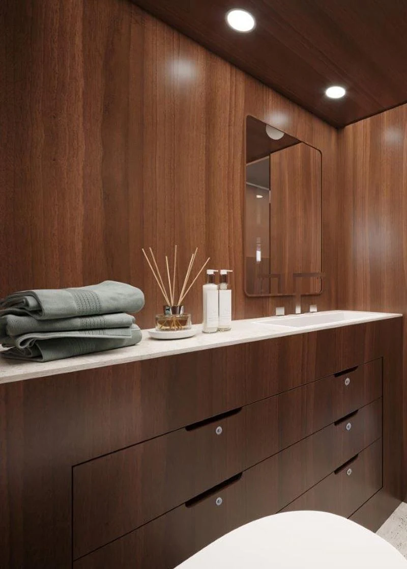 a bathroom with wooden walls aboard ONE DAY Yacht for Sale