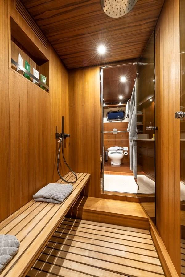 a bathroom with a wood floor aboard ONE DAY Yacht for Sale