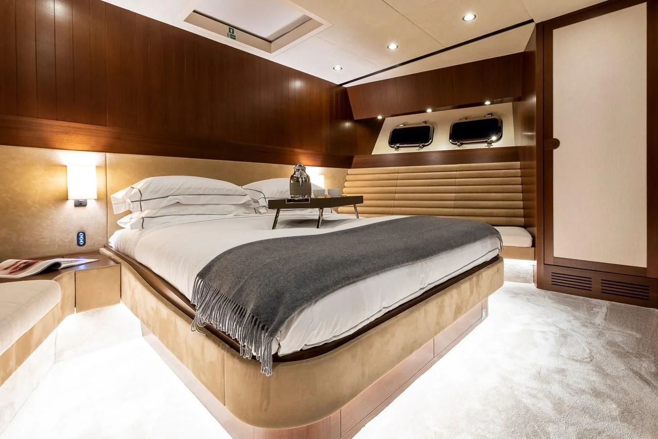 a room with a bed and a television aboard ONE DAY Yacht for Sale