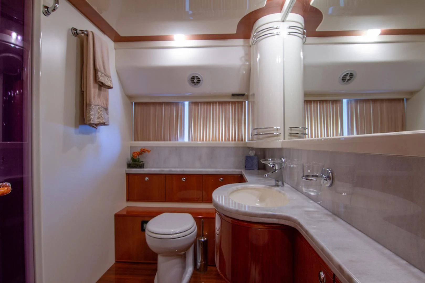 a bathroom with a sink and toilet aboard SEA PAL Yacht for Sale