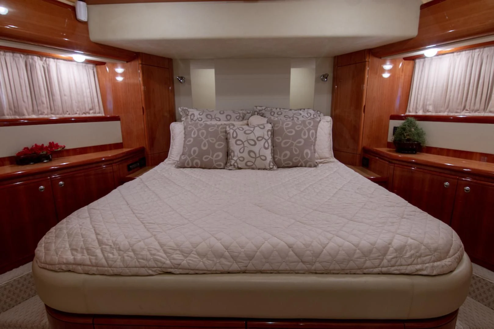 a bed with white sheets aboard SEA PAL Yacht for Sale