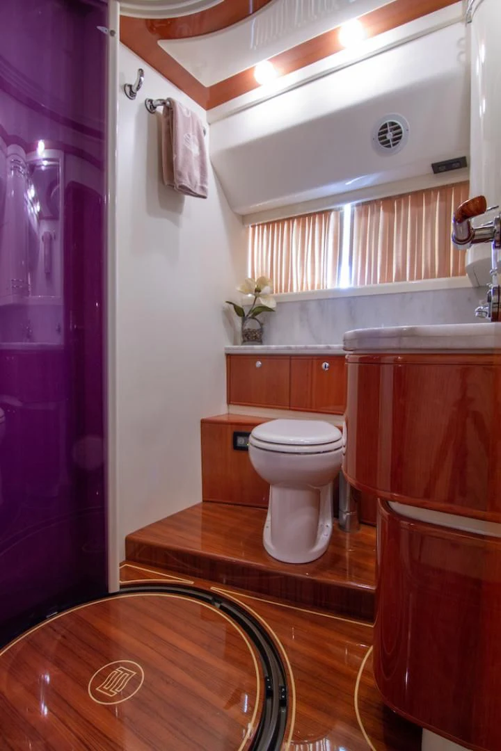 a bathroom with a toilet and sink aboard SEA PAL Yacht for Sale