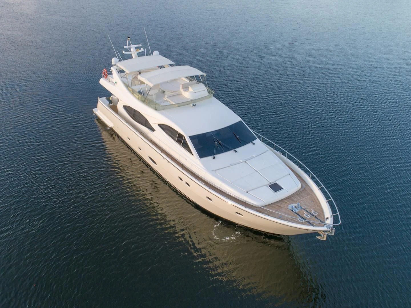 a white boat on the water aboard SEA PAL Yacht for Sale