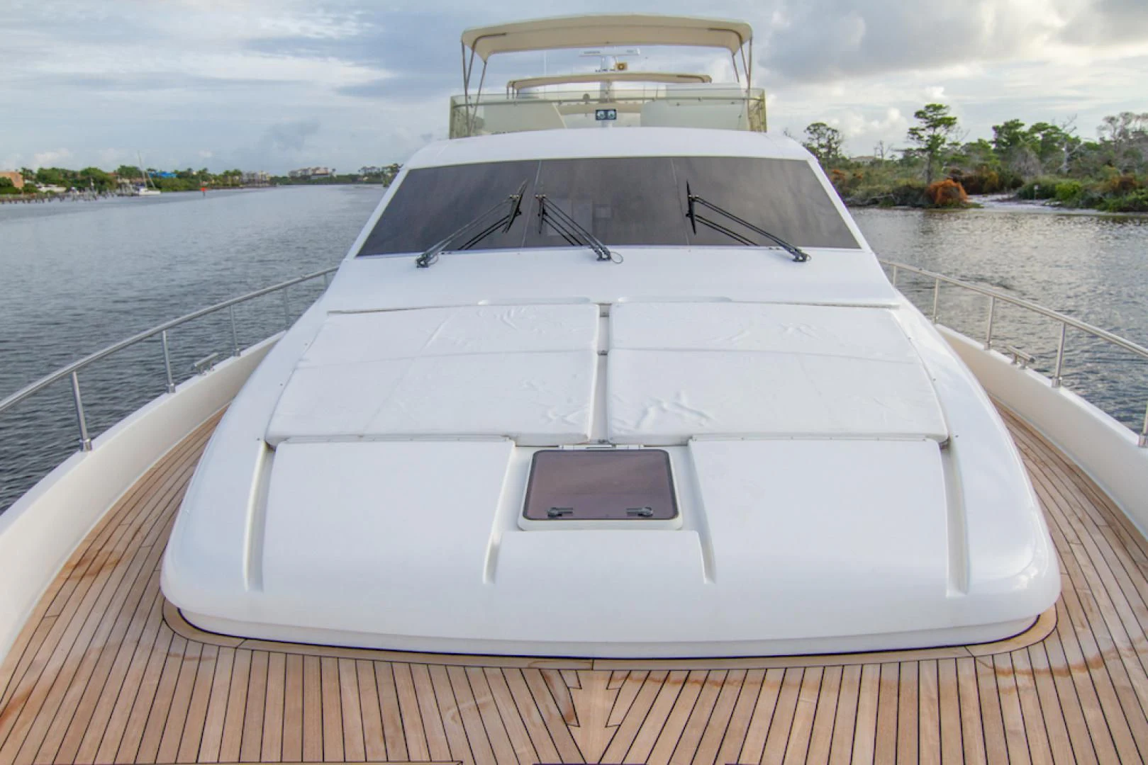 a white boat on a deck aboard SEA PAL Yacht for Sale