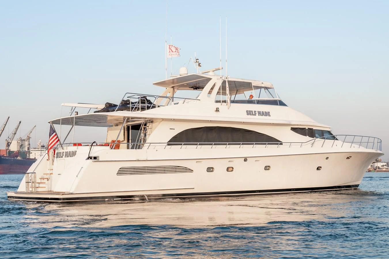 a white yacht in the water aboard SELF MADE Yacht for Sale