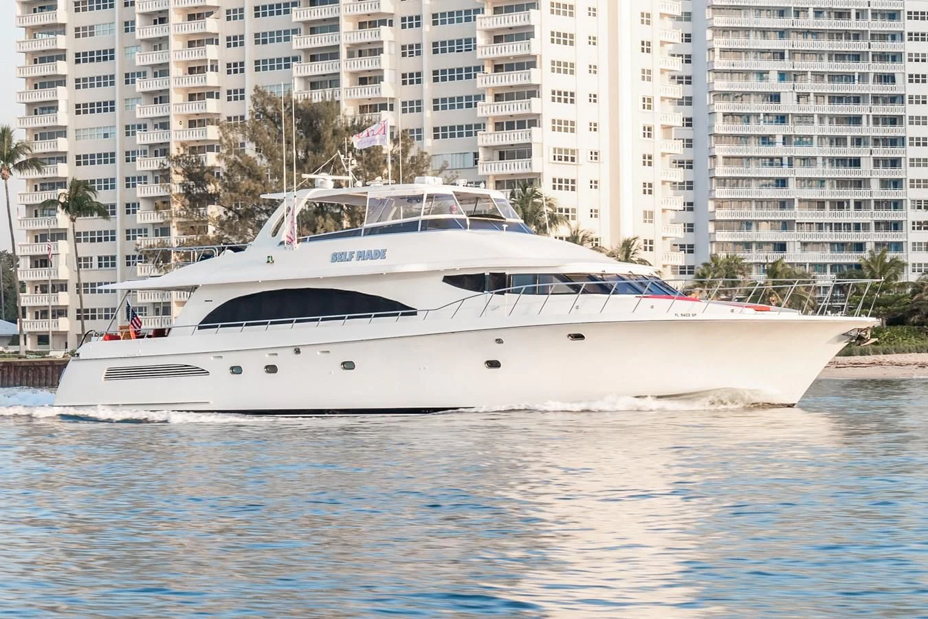 a white yacht in the water aboard SELF MADE Yacht for Sale