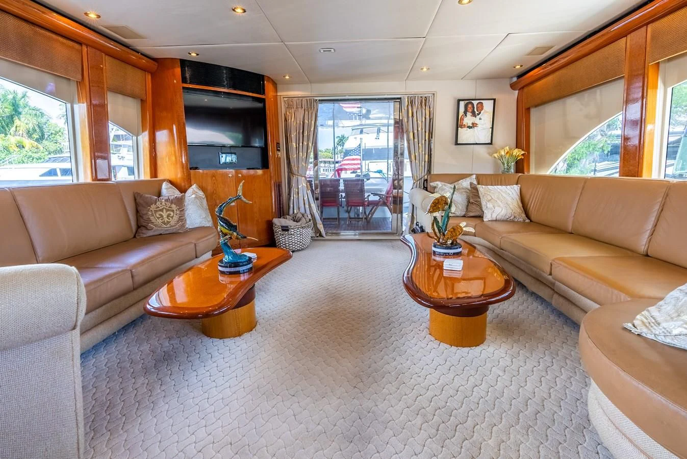a living room with a couch and a coffee table aboard SELF MADE Yacht for Sale