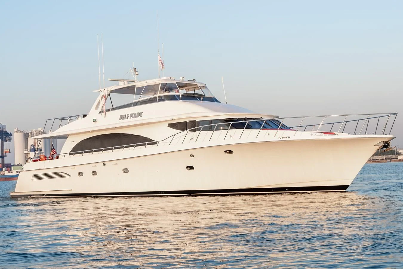 a white yacht in the water aboard SELF MADE Yacht for Sale