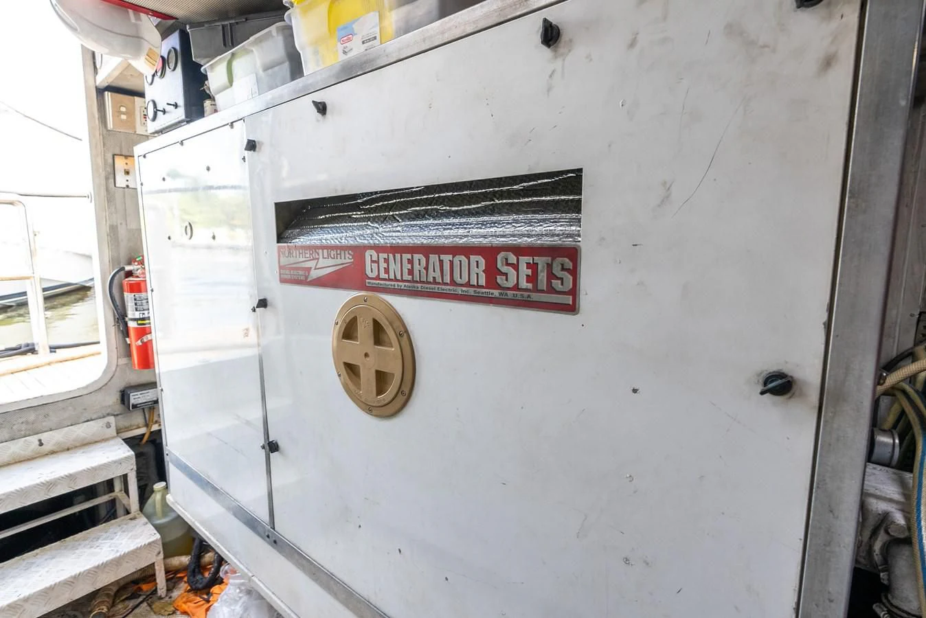 a white vehicle with a red license plate aboard SELF MADE Yacht for Sale