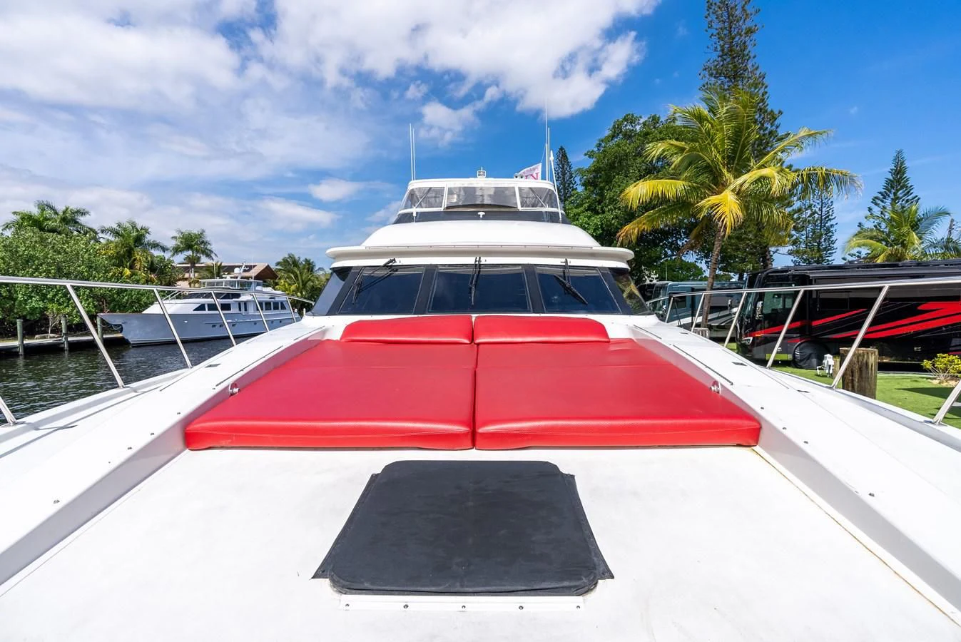 a red and white boat aboard SELF MADE Yacht for Sale