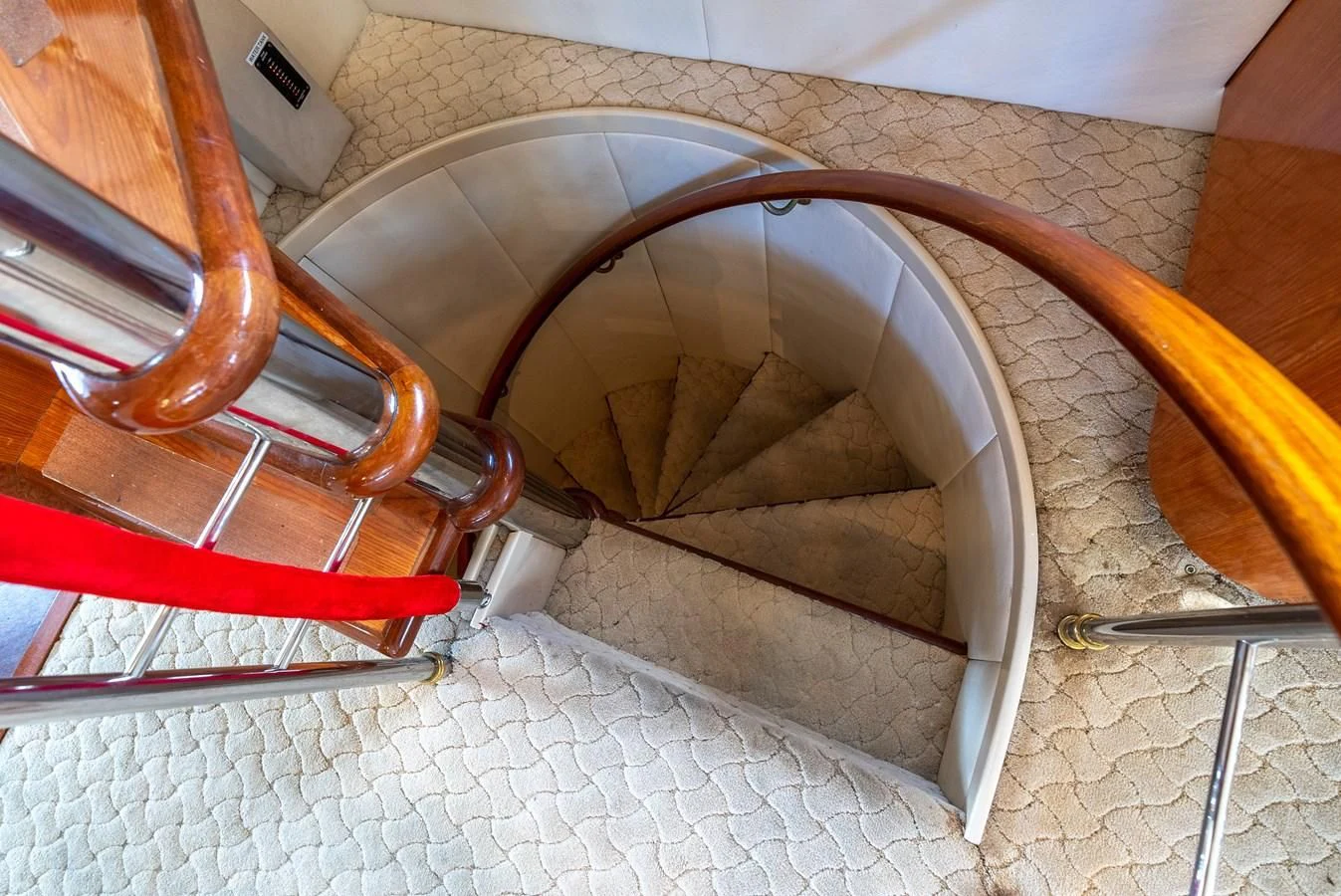 a chair on a tile floor aboard SELF MADE Yacht for Sale