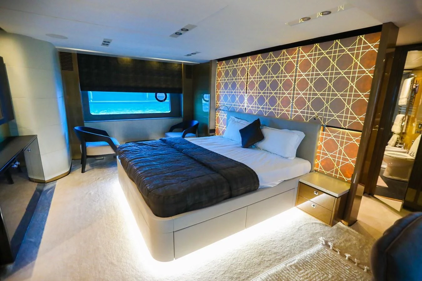 a bedroom with a large bed aboard M Yacht for Sale