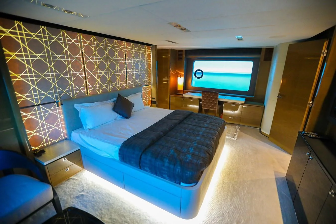 a bed in a room aboard M Yacht for Sale