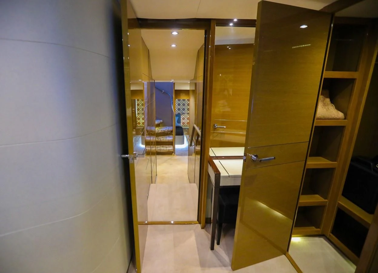 a room with a closet and shelves aboard M Yacht for Sale