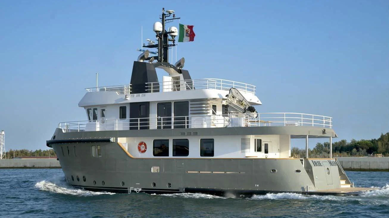 a large ship in the water aboard OCEAN KING 88 Yacht for Sale