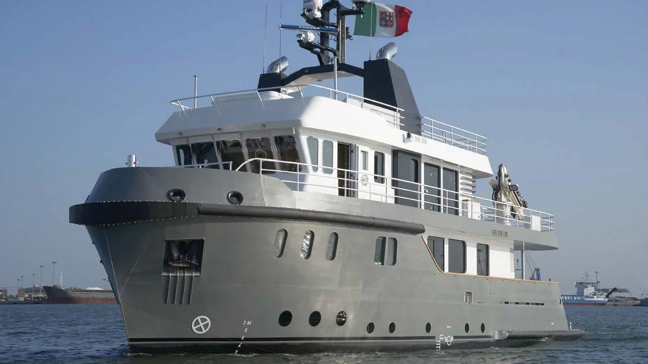 a large white boat on the water aboard OCEAN KING 88 Yacht for Sale