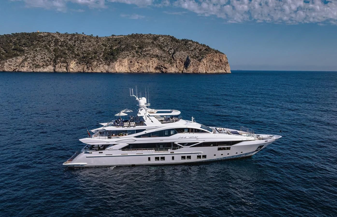 a white boat in the water aboard NEW WAVES Yacht for Sale