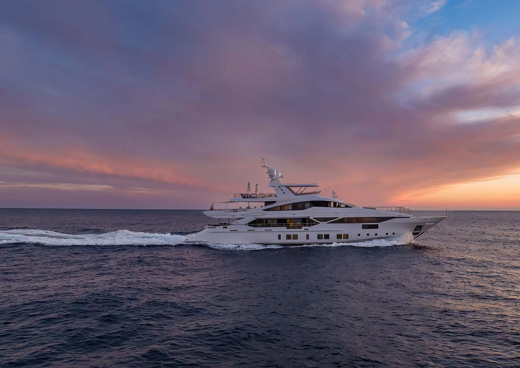 a boat on the beach aboard NEW WAVES Yacht for Sale