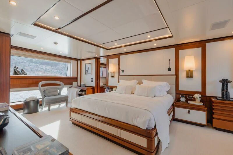 a large bedroom with a large bed aboard NEW WAVES Yacht for Sale