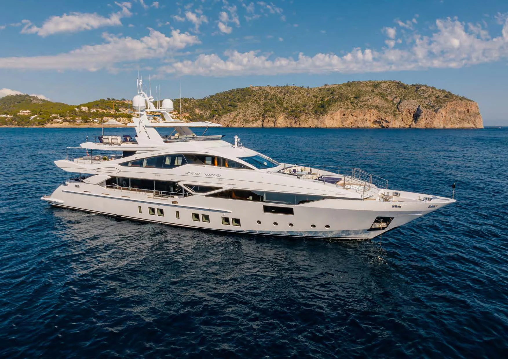 a white yacht in the water aboard NEW WAVES Yacht for Sale