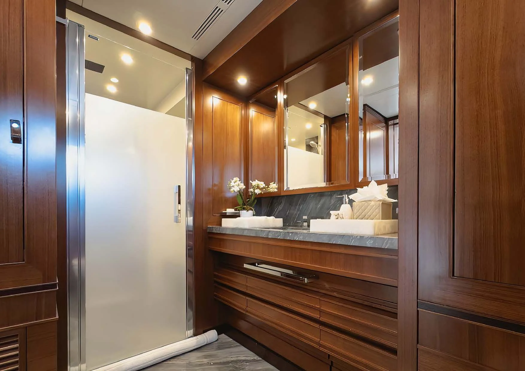 a bathroom with a large mirror aboard NEW WAVES Yacht for Sale