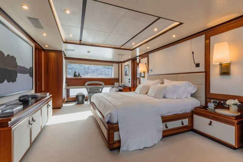 a large bedroom with a large bed aboard NEW WAVES Yacht for Sale