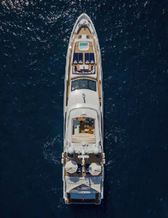 a white and gold boat aboard NEW WAVES Yacht for Sale
