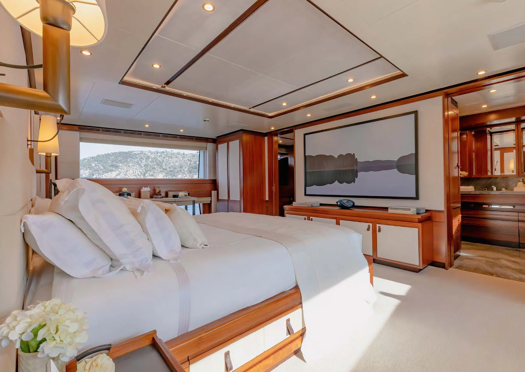 a bed in a room aboard NEW WAVES Yacht for Sale