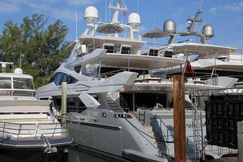 a large white boat docked aboard NEW WAVES Yacht for Sale