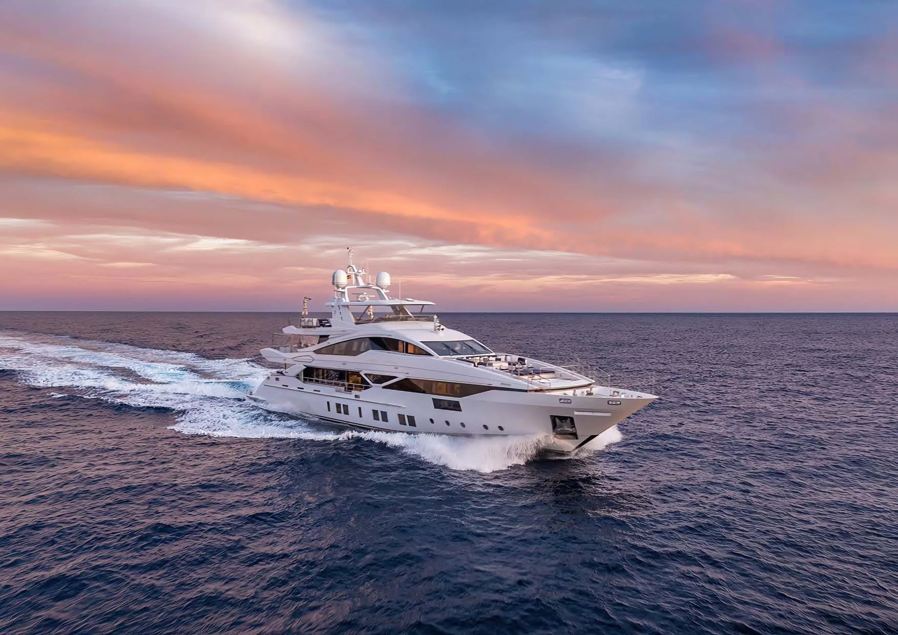 a white yacht on the beach aboard NEW WAVES Yacht for Sale