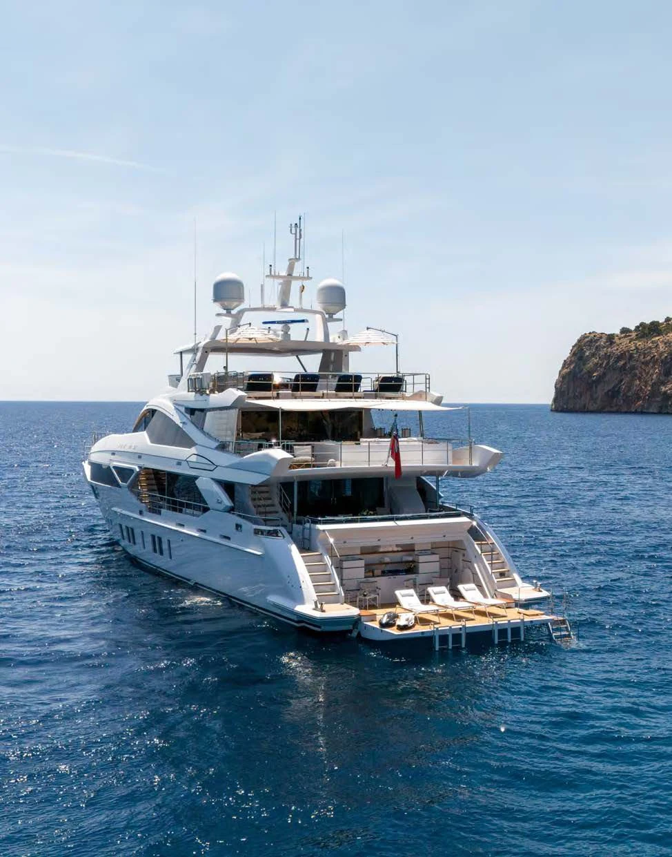 a boat with a smaller boat on it aboard NEW WAVES Yacht for Sale