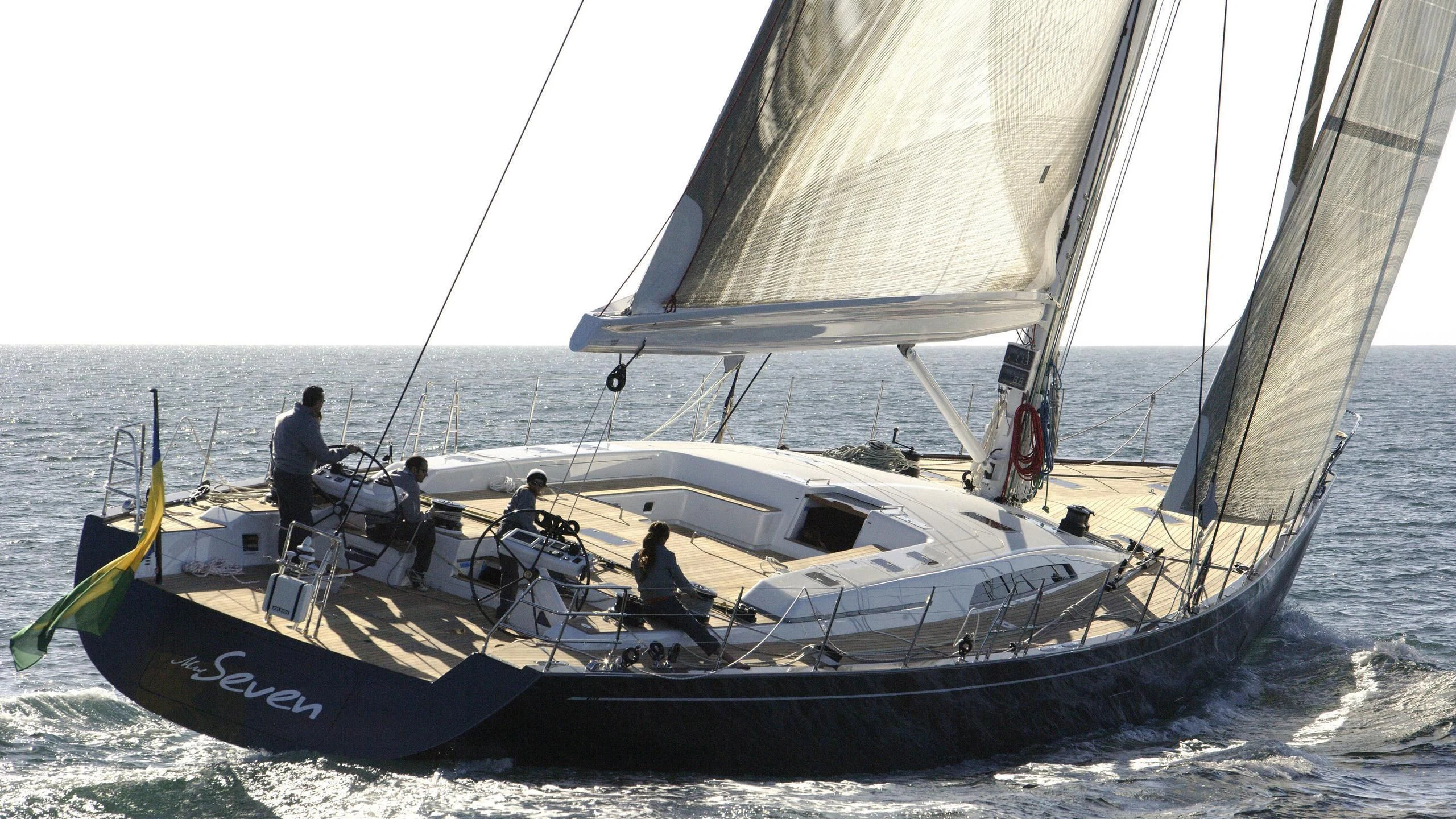 a group of people sailing on a boat aboard MRS SEVEN Yacht for Sale