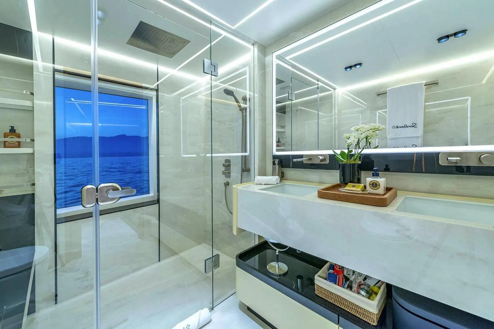 a room with a glass door aboard ALKHADRA Yacht for Charter