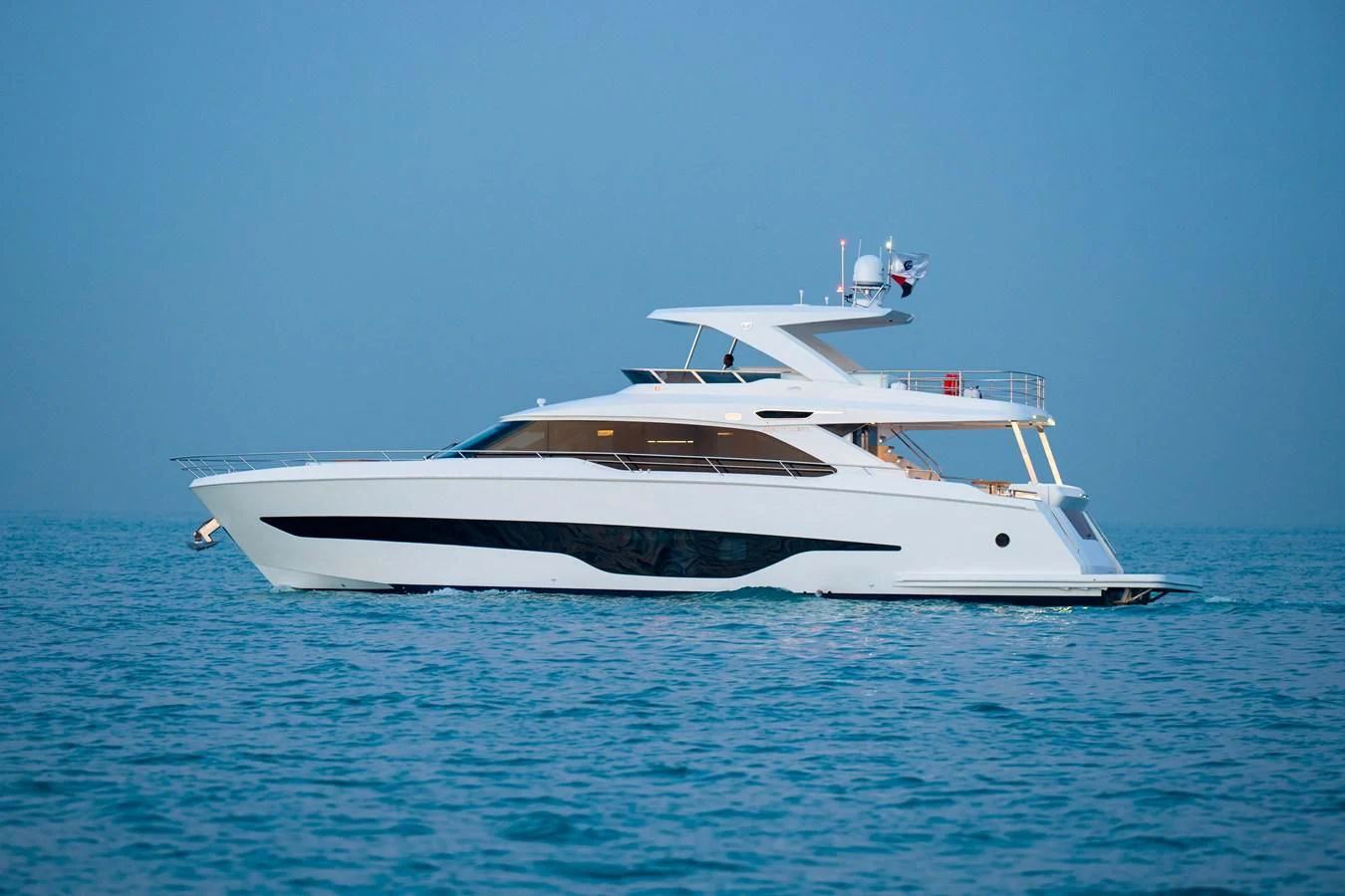 a white yacht in the water aboard ALKHADRA Yacht for Charter