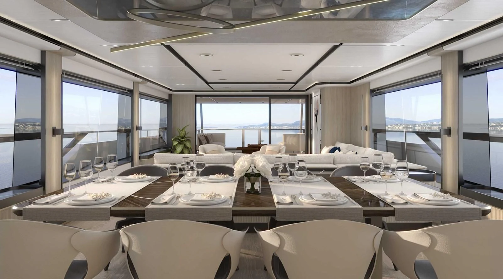 a room with tables and chairs aboard ALKHADRA Yacht for Charter