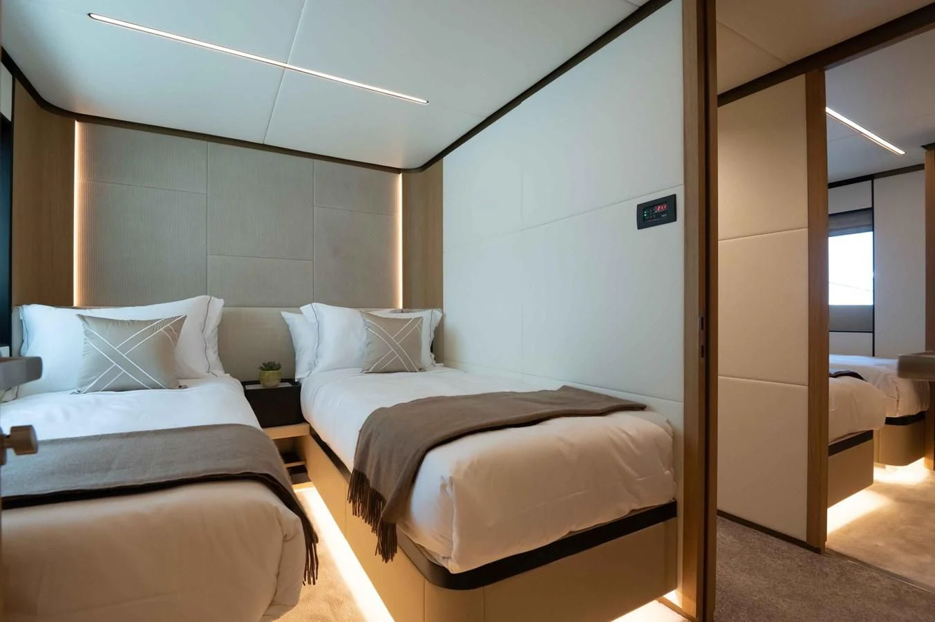 a room with two beds aboard ALKHADRA Yacht for Charter