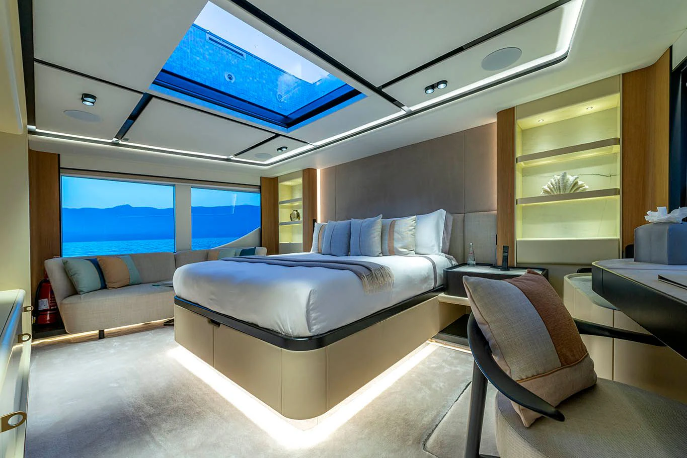 a room with a bed and a tv aboard ALKHADRA Yacht for Charter