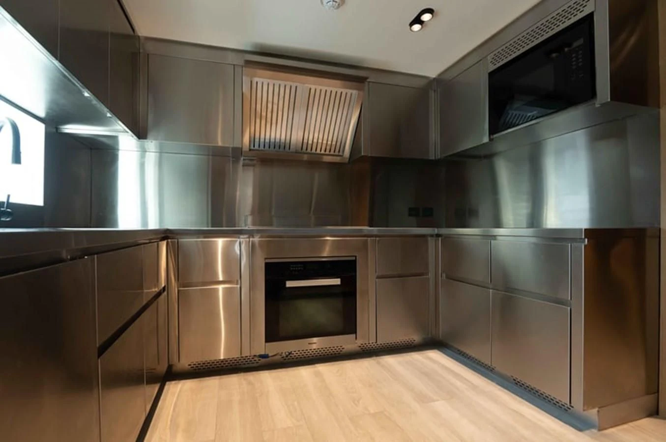 a kitchen with stainless steel appliances aboard ALKHADRA Yacht for Charter