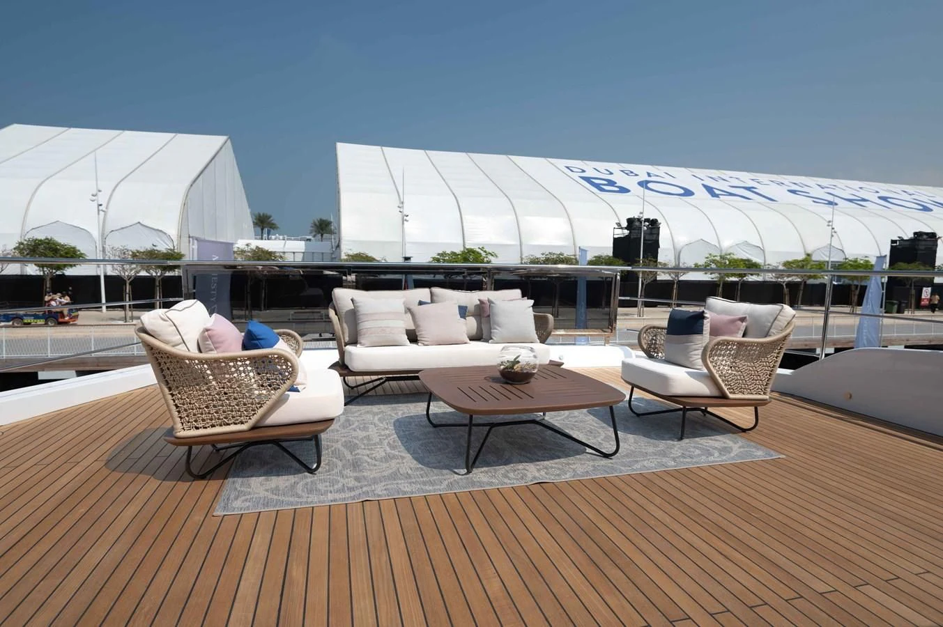 a patio with a table and chairs aboard ALKHADRA Yacht for Charter