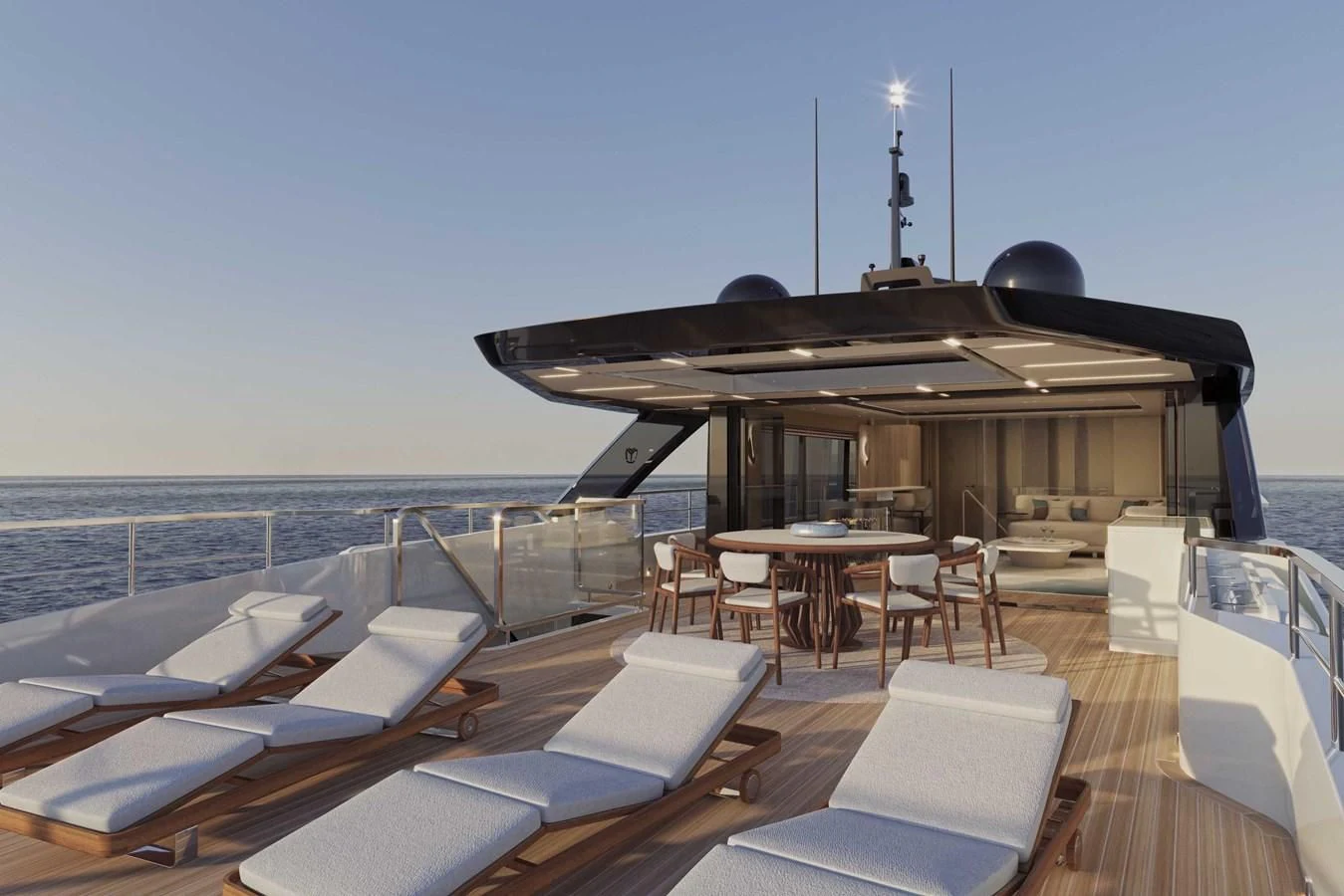 a deck with a large building and a pool with a deck and chairs aboard ALKHADRA Yacht for Charter