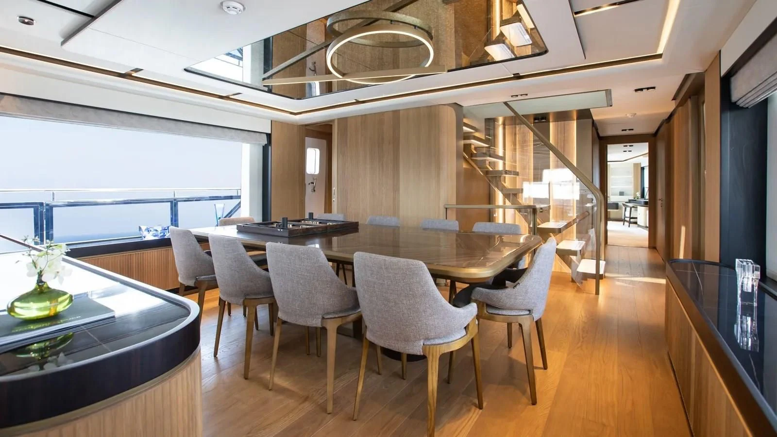 a room with a table and chairs aboard ALKHADRA Yacht for Charter